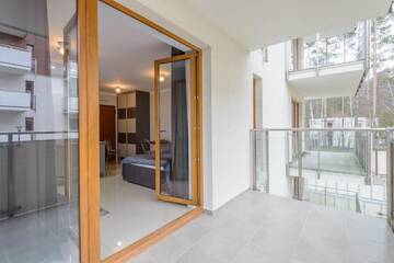 Фото номера Номер-студио с диваном-кроватью Апартаменты Apartamenty NCNK Baltic Park w Stegnie г. Стегна 5