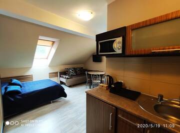Фото номера Четырехместный номер Апартаменты Apartamenty Gajówka- sauna jacuzzi, rowery г. Стегна 2