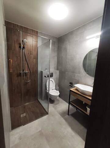 Фото номера Апартаменты с террасой Апартаменты Apartamenty Gajówka- sauna jacuzzi, rowery г. Стегна 4