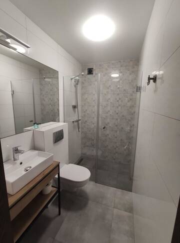 Фото номера Апартаменты с балконом Апартаменты Apartamenty Gajówka- sauna jacuzzi, rowery г. Стегна 2