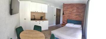 Фото номера Номер-студио с террасой Апартаменты Apartamenty Gajówka- sauna jacuzzi, rowery г. Стегна 3