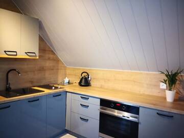Фото номера Семейный люкс Апартаменты Apartamenty Gajówka- sauna jacuzzi, rowery г. Стегна 7