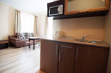 Фото номера Четырехместный номер Апартаменты Apartamenty Gajówka- sauna jacuzzi, rowery г. Стегна 5