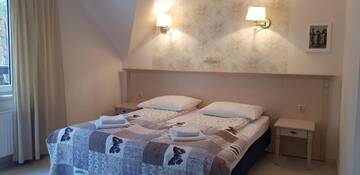Фото номера Двухместный номер с 2 отдельными кроватями и балконом Отель Hotel Krakus г. Стегна 5